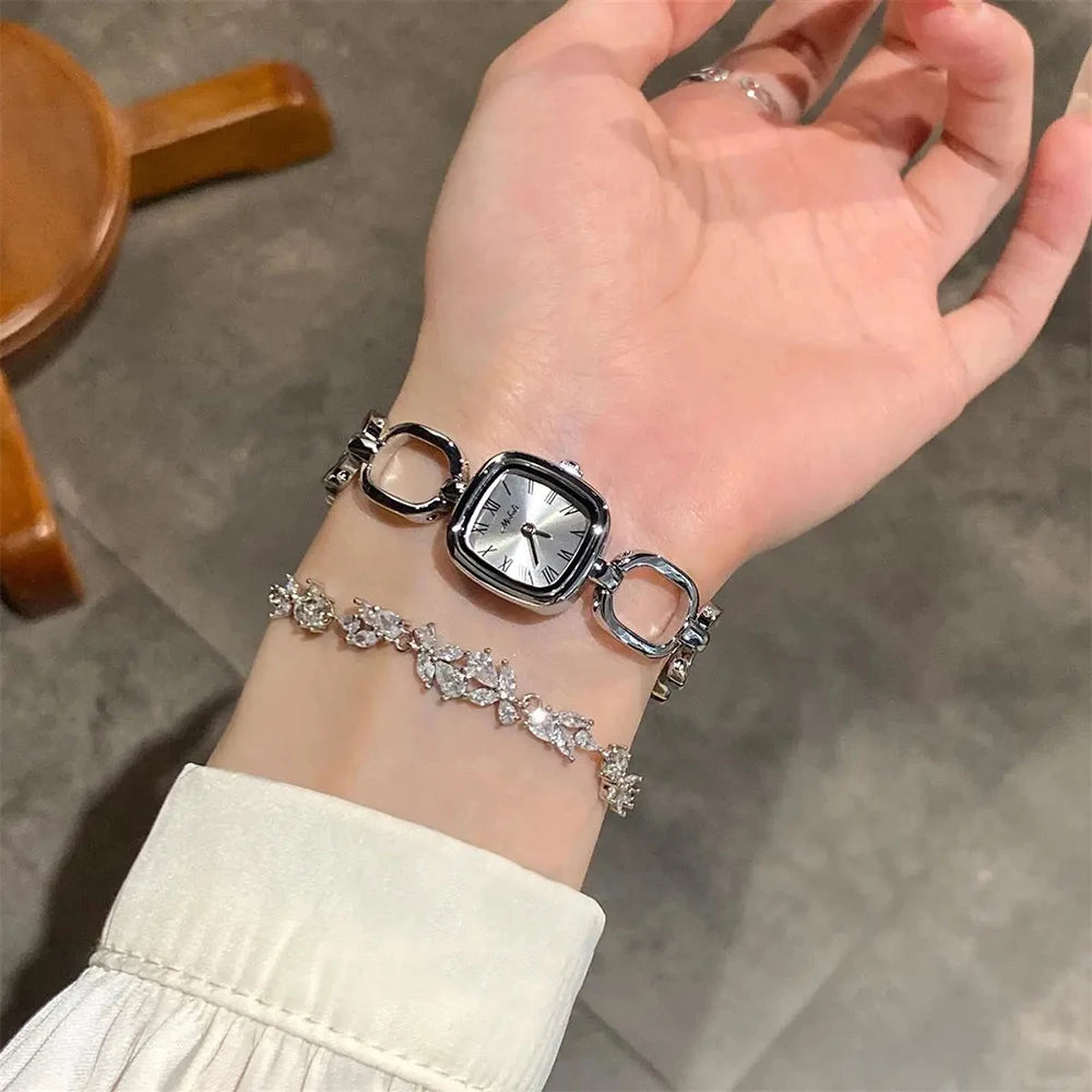 GEDI Women's Watch Fashion Gold Hollow Strap Quartz Niche Light Luxury Vintage Casual Square Dial Female Wrist Watch Gifts