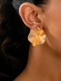 A Pair of Irregular Round Metal Stud Earrings Jewelry