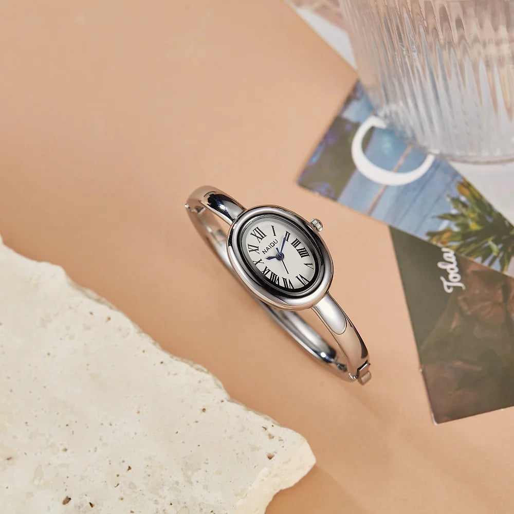 NAIDU Elegant Oval Bangle Watch For Women Roman Numeral Dial Gold Silver Cuff Strap Waterproof Quartz Wristwatch Reloj Mujer