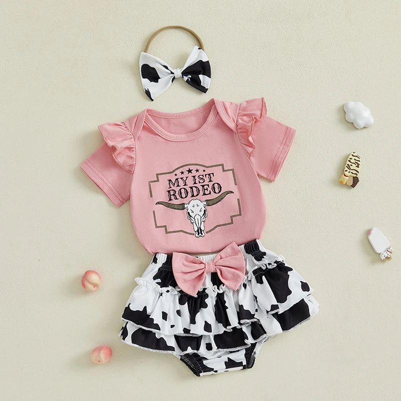 Pudcoco Infant Baby Girl Western Outfits Letter Short Sleeve Romper + Cow Print Tiered Ruffled Shorts + Bow Headband Set 0-18M