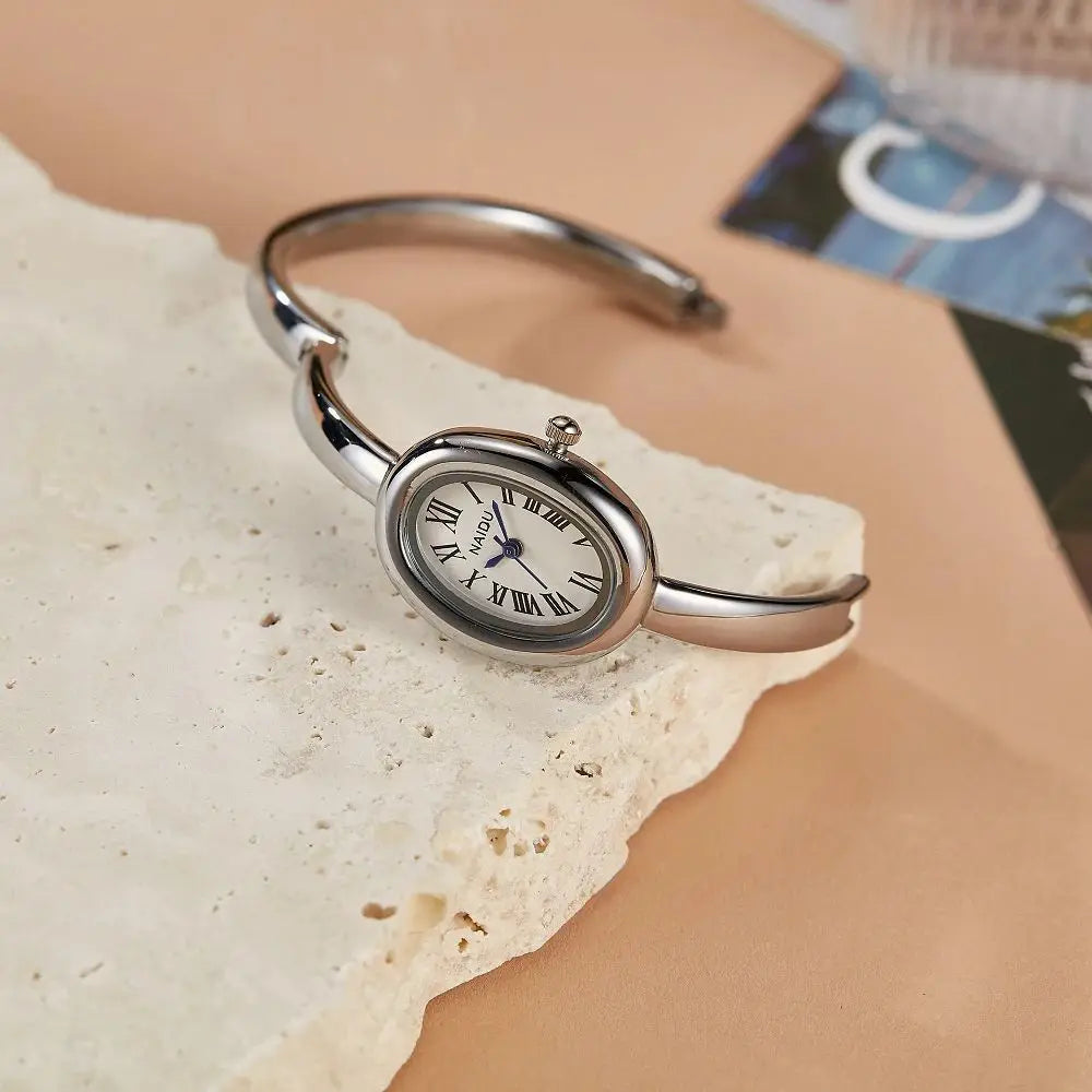 NAIDU Elegant Oval Bangle Watch For Women Roman Numeral Dial Gold Silver Cuff Strap Waterproof Quartz Wristwatch Reloj Mujer