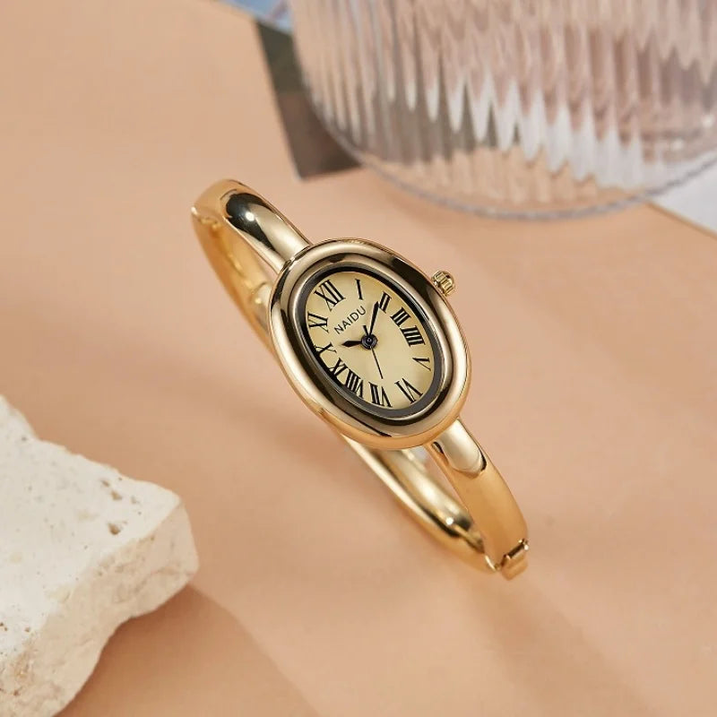 NAIDU Elegant Oval Bangle Watch For Women Roman Numeral Dial Gold Silver Cuff Strap Waterproof Quartz Wristwatch Reloj Mujer