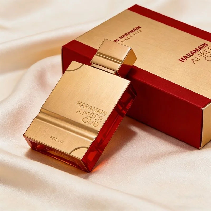 Al Haramain Amber Oud Ruby Edition, The red gold contrasting bottle body is as hot as a gemstone, and the sweet fragrance of berries and roses begins, light and long-lastin.g