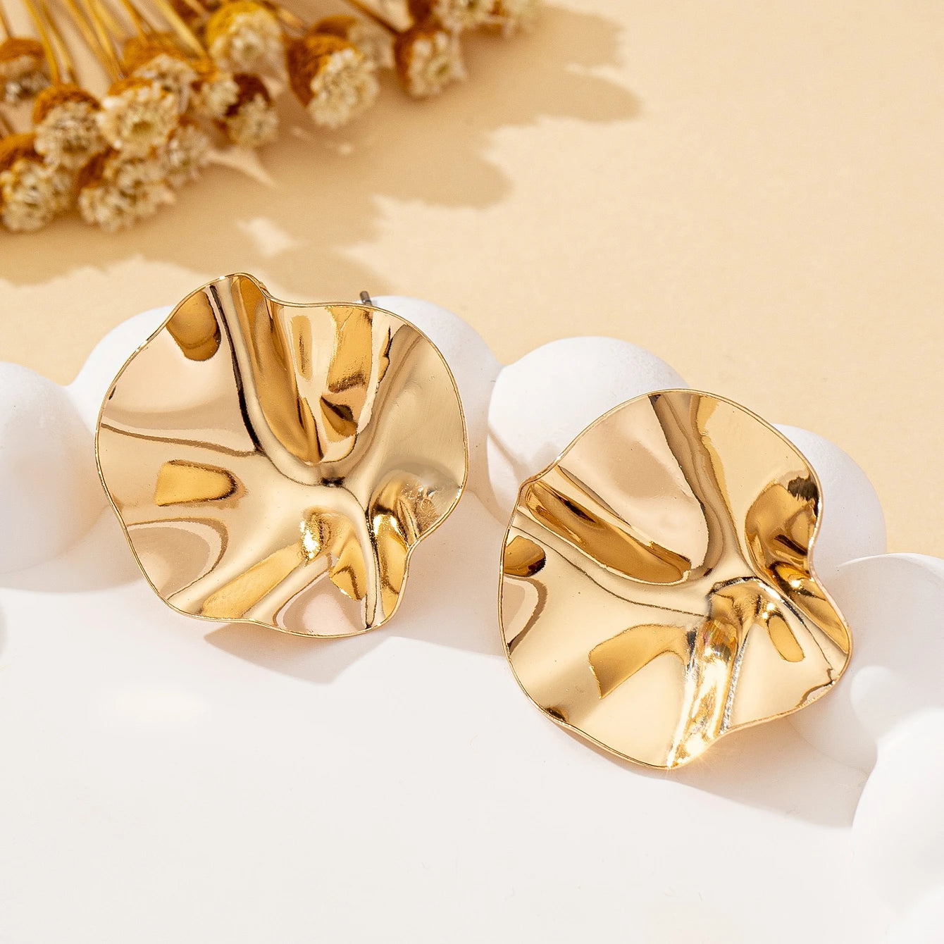 A Pair of Irregular Round Metal Stud Earrings Jewelry