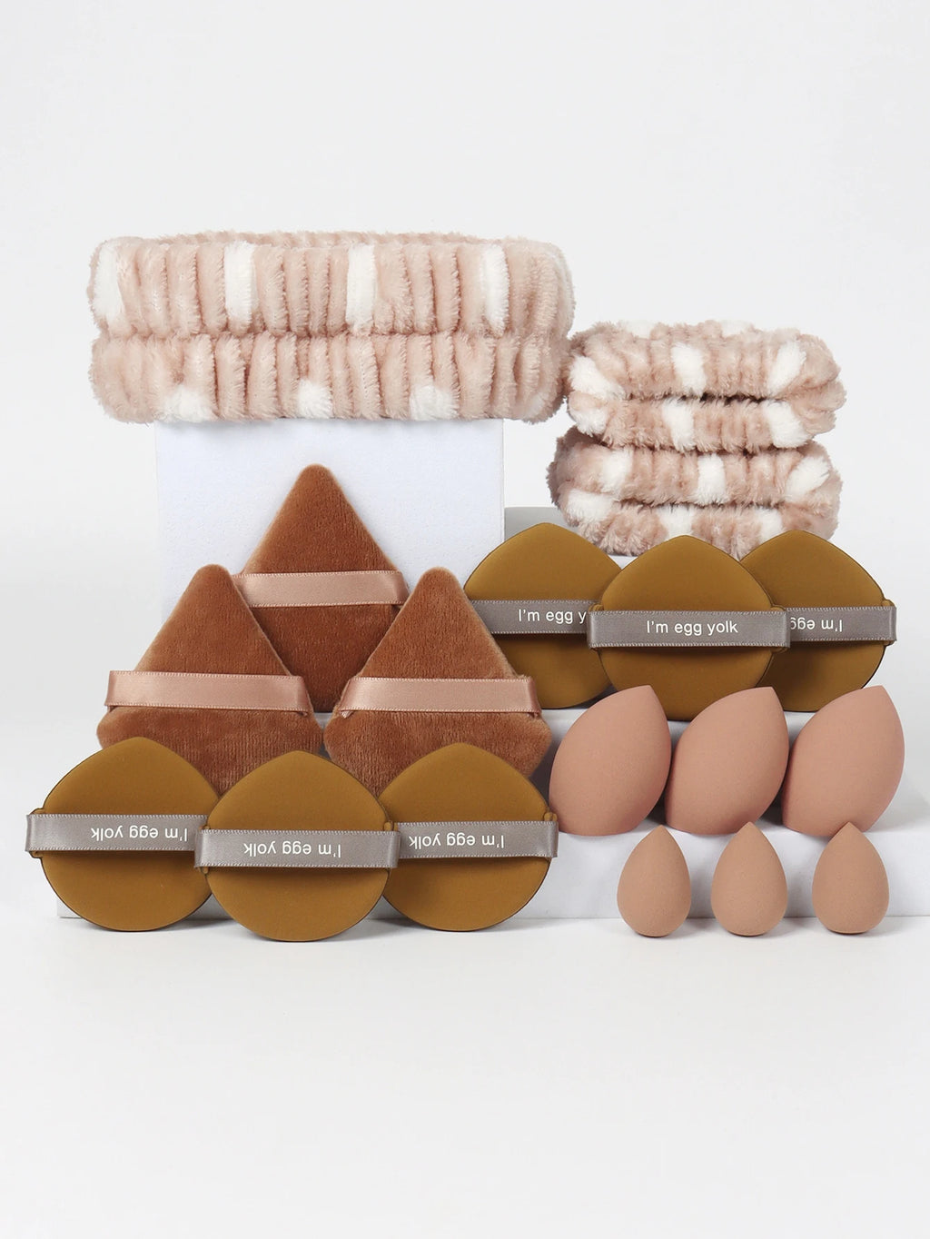 18 Piece Headband Set. 1 Hair Band & 2 Wrist Bands & 3 Make-Up Sponges & 3 Mini Square Air Cushions & 3 Triangular Powder Puff &