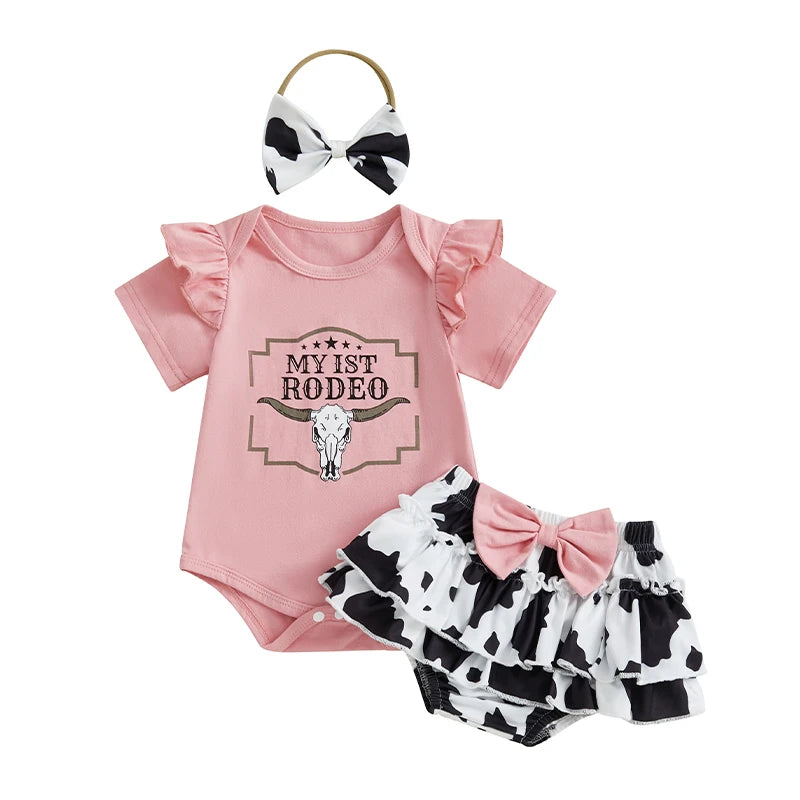 Pudcoco Infant Baby Girl Western Outfits Letter Short Sleeve Romper + Cow Print Tiered Ruffled Shorts + Bow Headband Set 0-18M