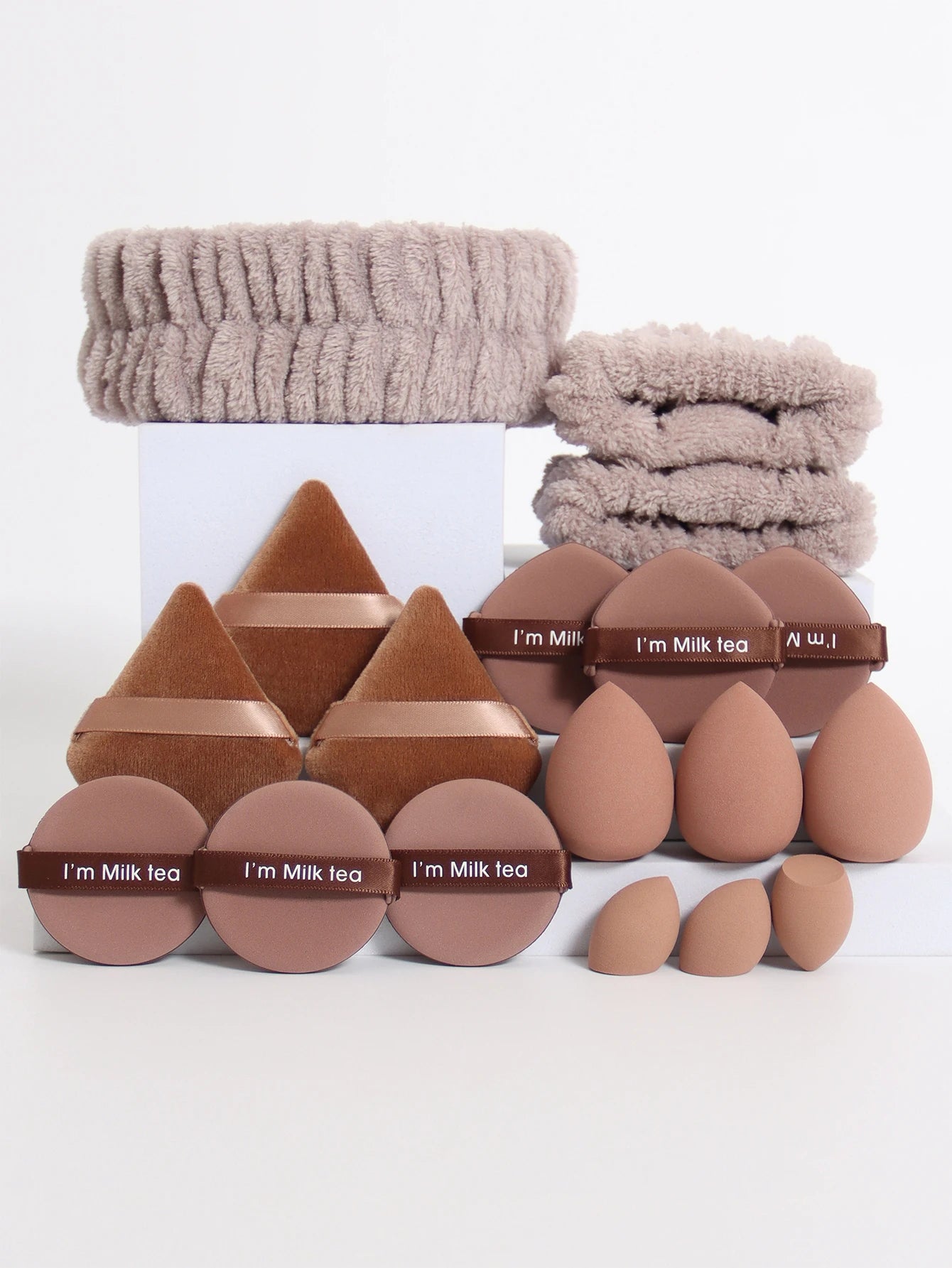 18 Piece Headband Set. 1 Hair Band & 2 Wrist Bands & 3 Make-Up Sponges & 3 Mini Square Air Cushions & 3 Triangular Powder Puff &