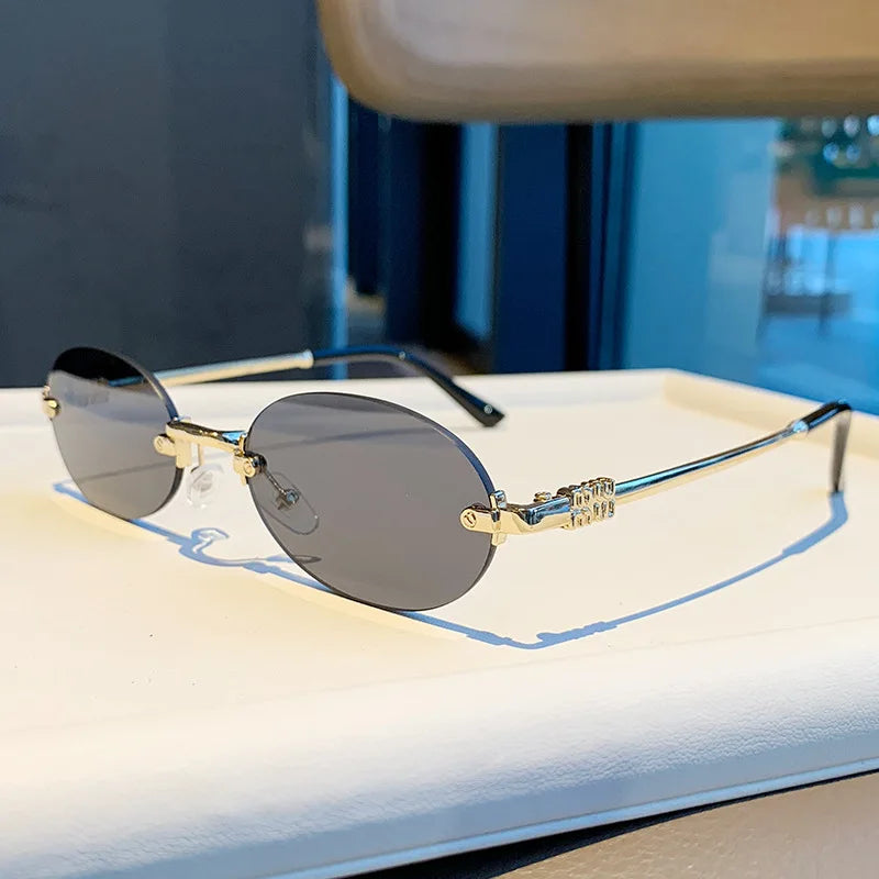 Light Luxury Rimless Oval Personalized Sunglasses, High-End Fashion Casual Sunglasses, Suitable For Outdoor Vacation Sunglasses