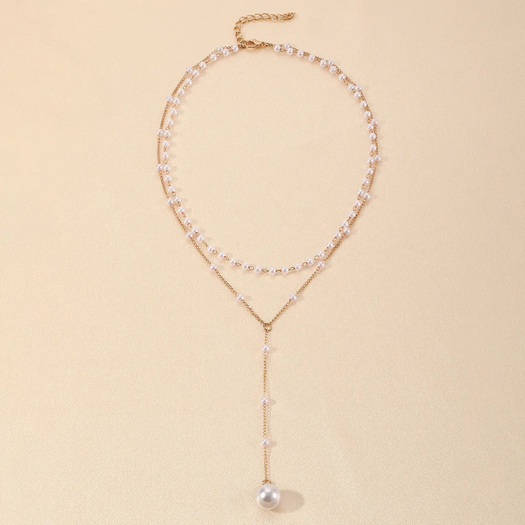 ZAKOL Korean Fashion Imitation Pearl Double Layered Choker Big Ball Bead Pendant Tassel Necklace Women's Sexy Party Body Jewelry