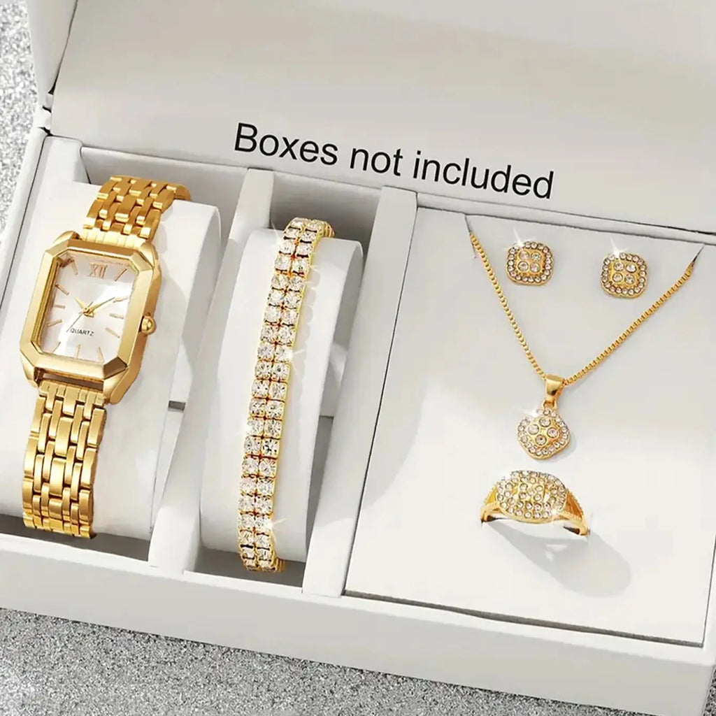 A lady's compact quartz watch and a set of hollowed-out and jeweled decorations, suitable as a holiday gift, without the box.