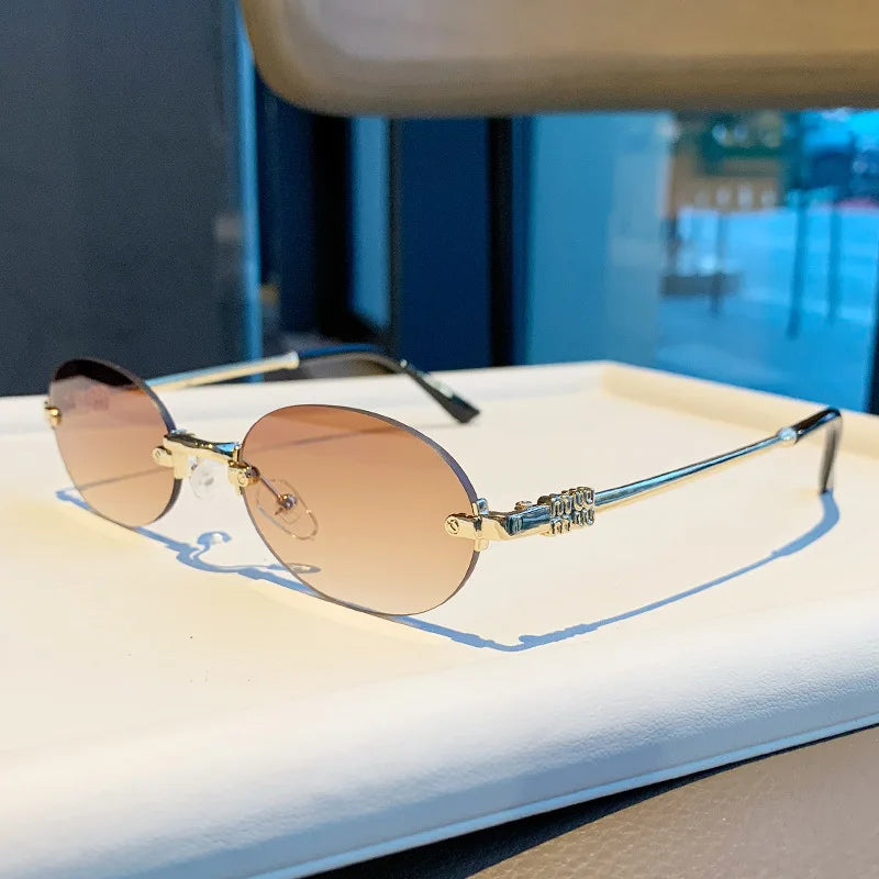 Light Luxury Rimless Oval Personalized Sunglasses, High-End Fashion Casual Sunglasses, Suitable For Outdoor Vacation Sunglasses