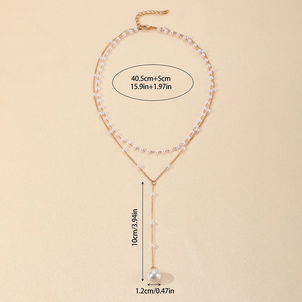 ZAKOL Korean Fashion Imitation Pearl Double Layered Choker Big Ball Bead Pendant Tassel Necklace Women's Sexy Party Body Jewelry
