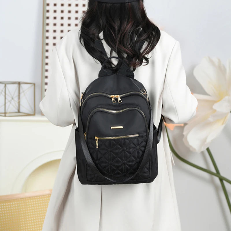 Elegant Quilted Nylon Women Backpack Gold Hardware Rucksack Multi‑slot Shoulder Bag For Casual Shopping Travel Activities