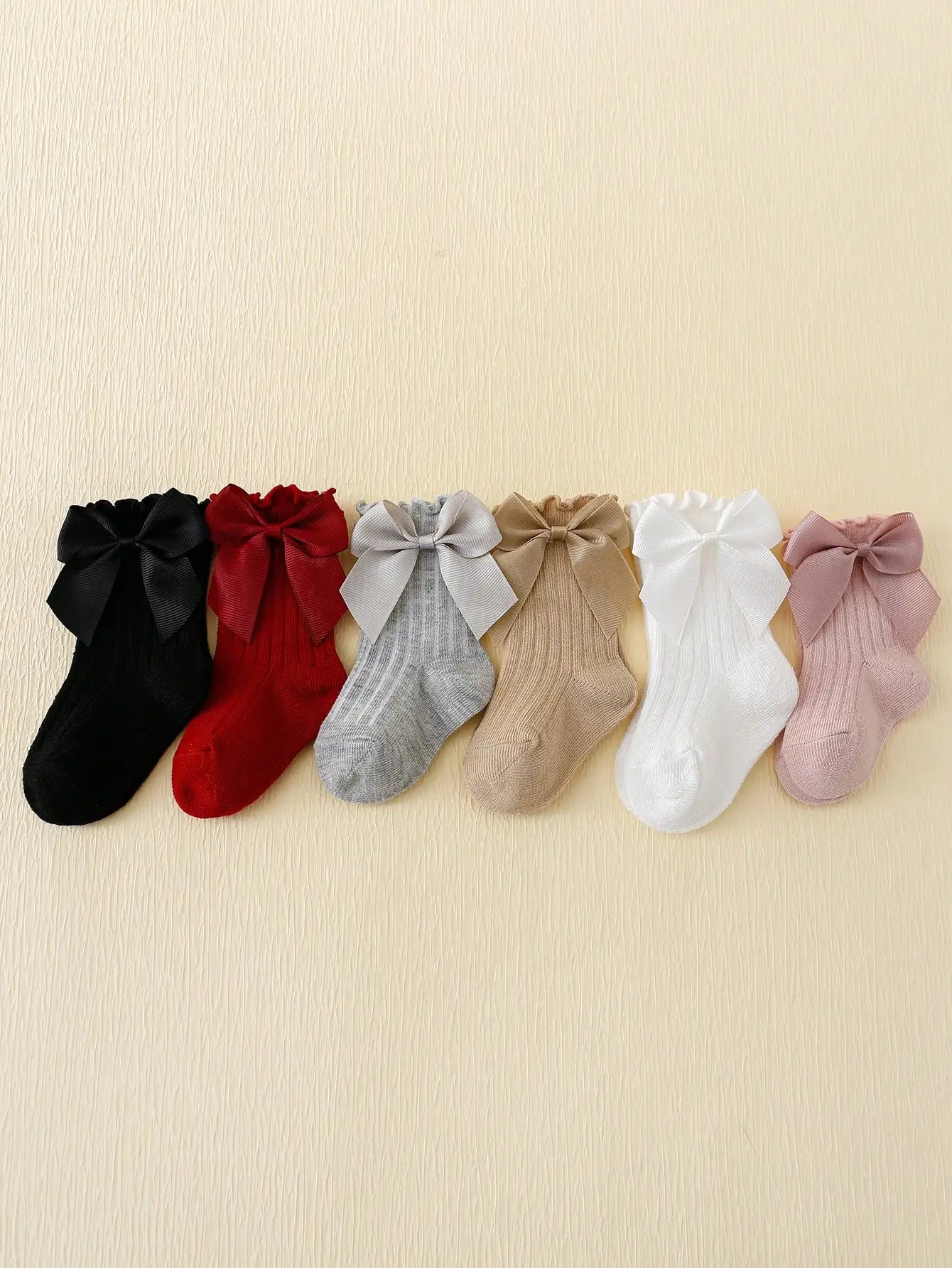 6 pairs of Rowan Bow lace baby bubble mouth socks