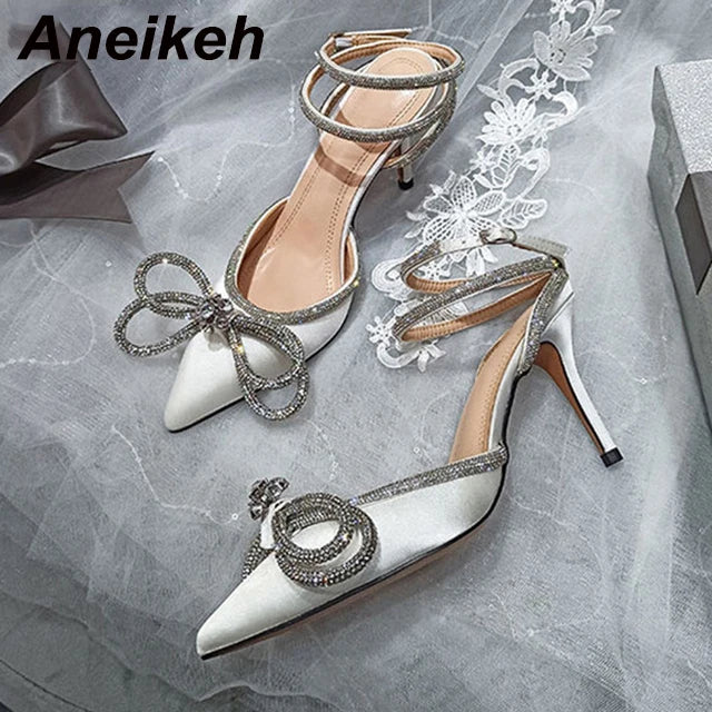Aneikeh PVC Style Glitter Rhinestones Women Pumps Crystal Bowknot Satin Lady Silk High Heels Party Shoes 2025 Spring Size 35-42
