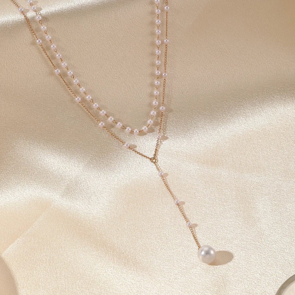 ZAKOL Korean Fashion Imitation Pearl Double Layered Choker Big Ball Bead Pendant Tassel Necklace Women's Sexy Party Body Jewelry