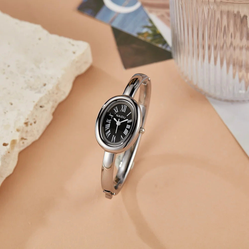 NAIDU Elegant Oval Bangle Watch For Women Roman Numeral Dial Gold Silver Cuff Strap Waterproof Quartz Wristwatch Reloj Mujer