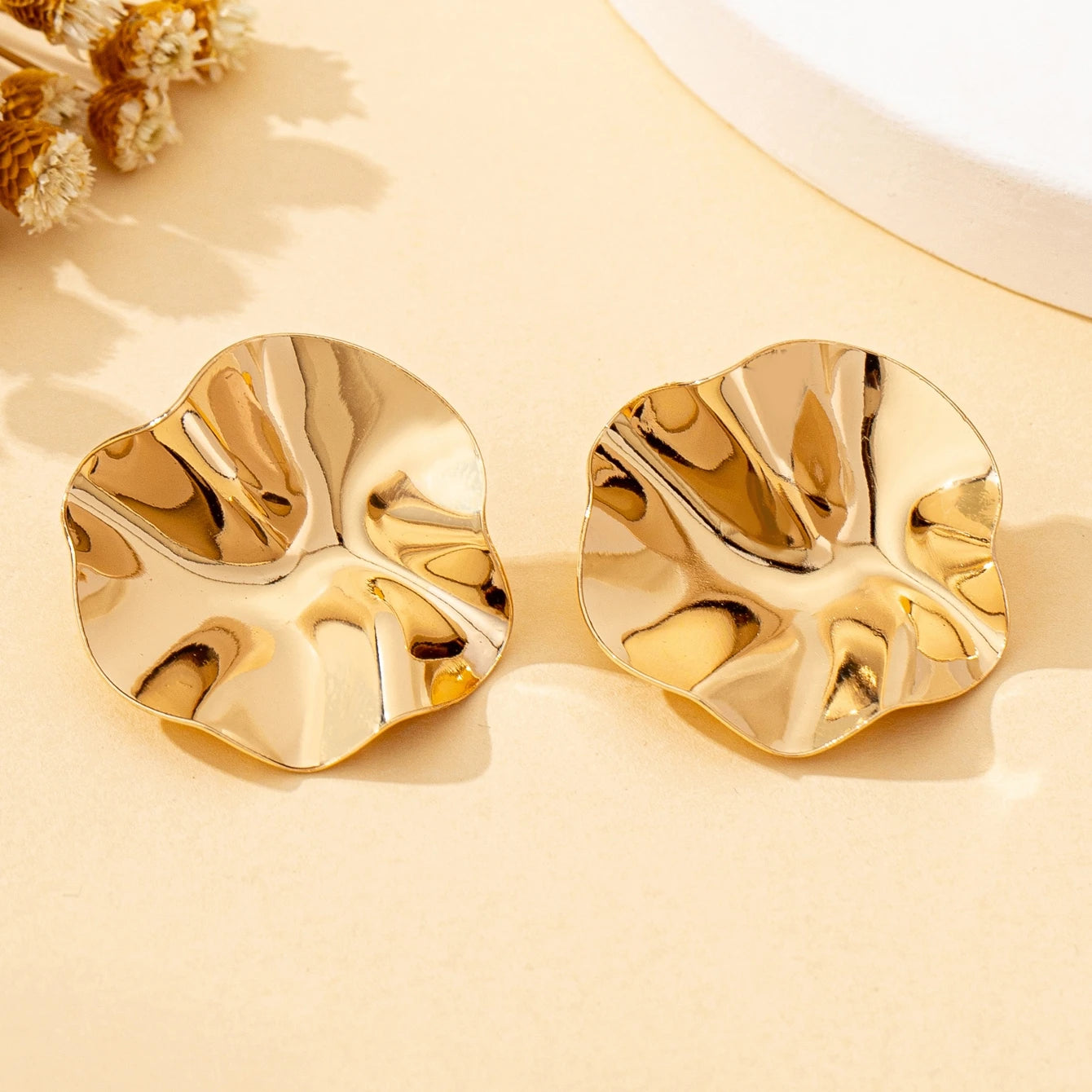 A Pair of Irregular Round Metal Stud Earrings Jewelry