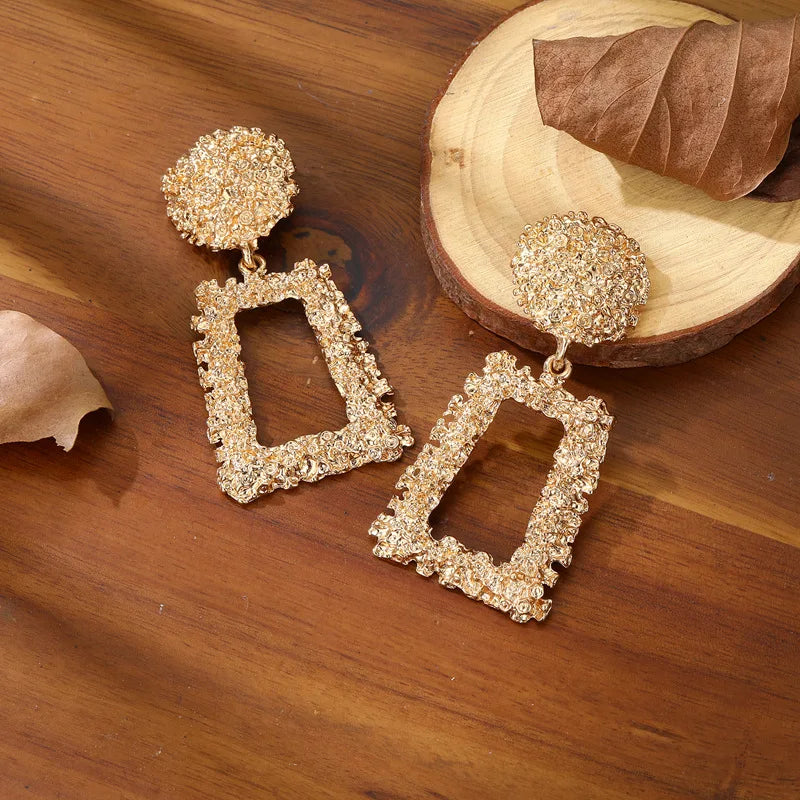 Elegant and exaggerated matte geometric earrings with creative relief trapezoidal long pendants for Westerners