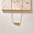 L87 Versatile and niche design: Small eggplant pendant, geometric curved tube, gold necklace, stainless steel jewelry