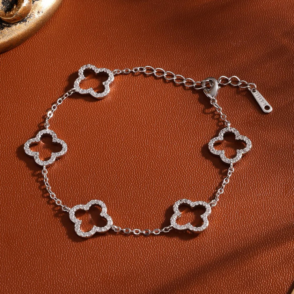 Elegant Female Stainless Steel Bracelet With Zircon Four-Leaf Clover Design Hollow Detail Fashion Accessory For Small Waist