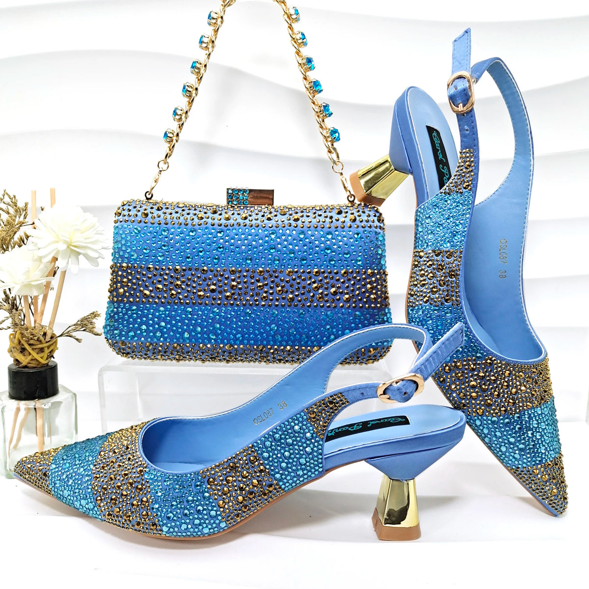 New Italian Design Stylish And Elegant Sky Blue Rhinestone Embellished Satin Pointy Toe Pumps And Clutch Bag