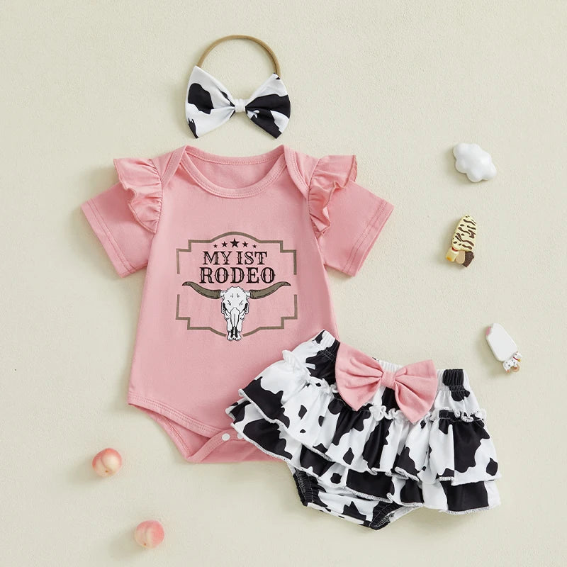 Pudcoco Infant Baby Girl Western Outfits Letter Short Sleeve Romper + Cow Print Tiered Ruffled Shorts + Bow Headband Set 0-18M