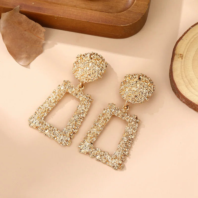 Elegant and exaggerated matte geometric earrings with creative relief trapezoidal long pendants for Westerners