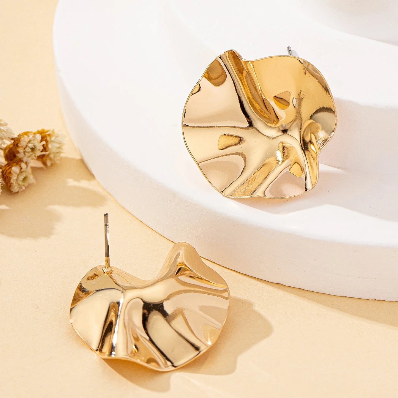 A Pair of Irregular Round Metal Stud Earrings Jewelry