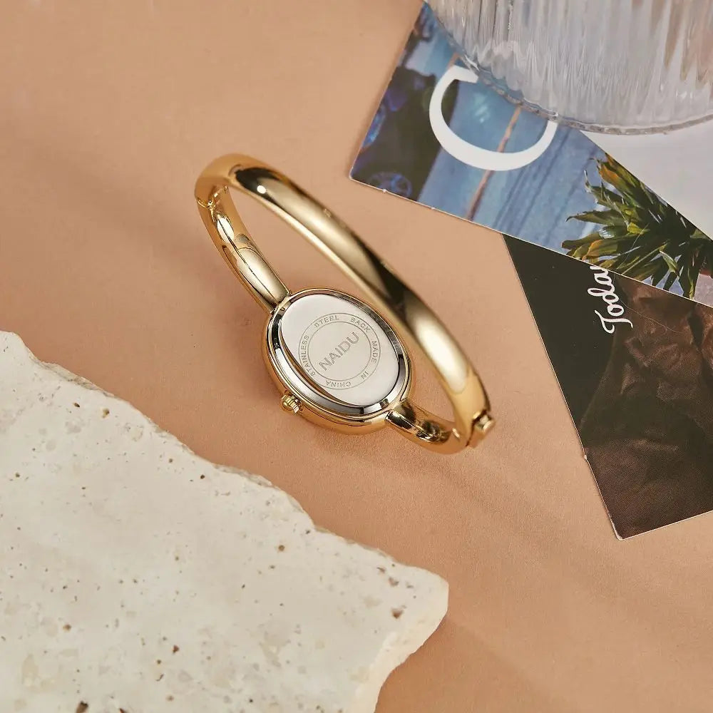 NAIDU Elegant Oval Bangle Watch For Women Roman Numeral Dial Gold Silver Cuff Strap Waterproof Quartz Wristwatch Reloj Mujer