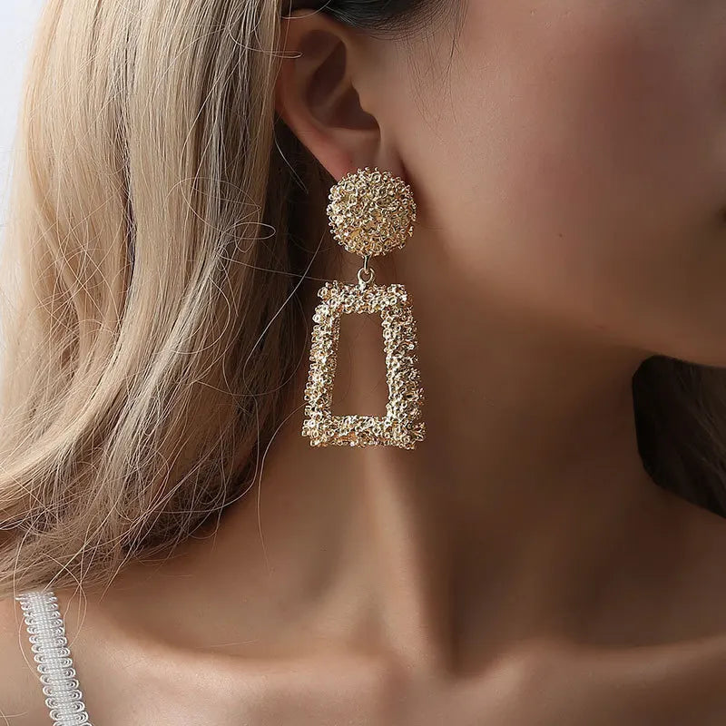 Elegant and exaggerated matte geometric earrings with creative relief trapezoidal long pendants for Westerners