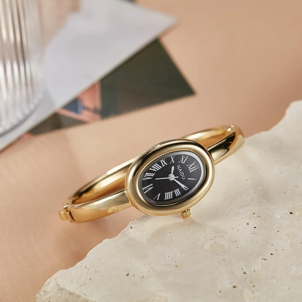 NAIDU Elegant Oval Bangle Watch For Women Roman Numeral Dial Gold Silver Cuff Strap Waterproof Quartz Wristwatch Reloj Mujer