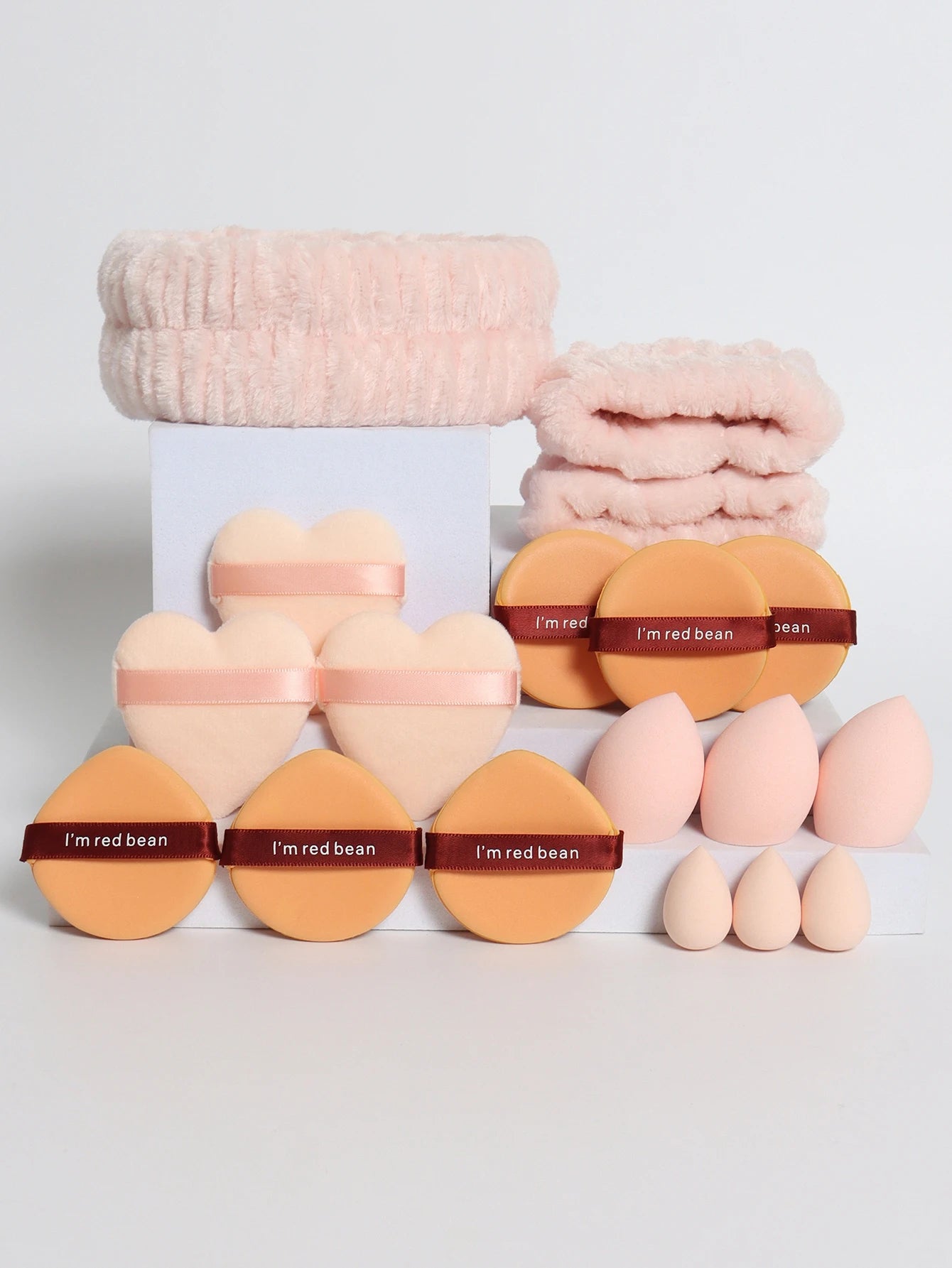 18 Piece Headband Set. 1 Hair Band & 2 Wrist Bands & 3 Make-Up Sponges & 3 Mini Square Air Cushions & 3 Triangular Powder Puff &
