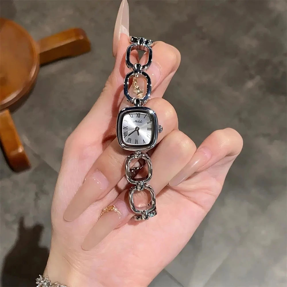 GEDI Women's Watch Fashion Gold Hollow Strap Quartz Niche Light Luxury Vintage Casual Square Dial Female Wrist Watch Gifts